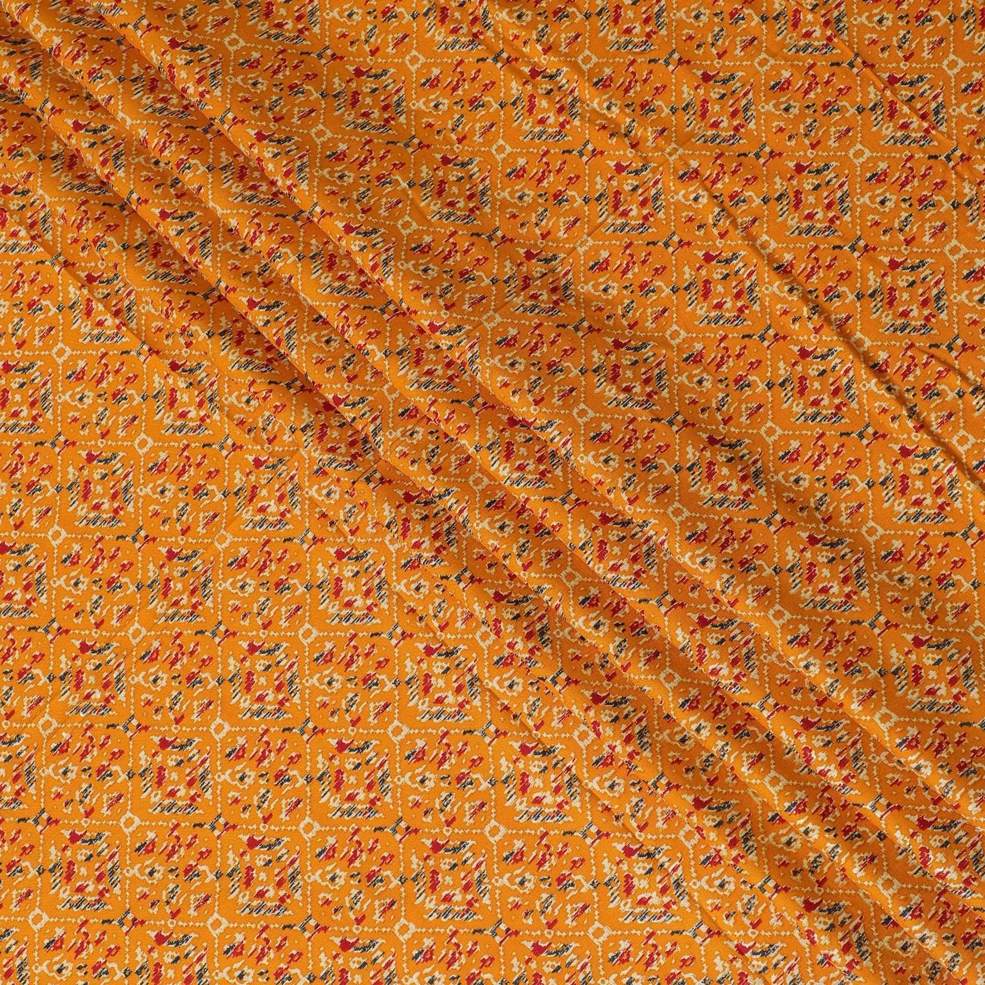 Mustard orange cotton viscose fabric with black, orange and gold print in batik design-D14195