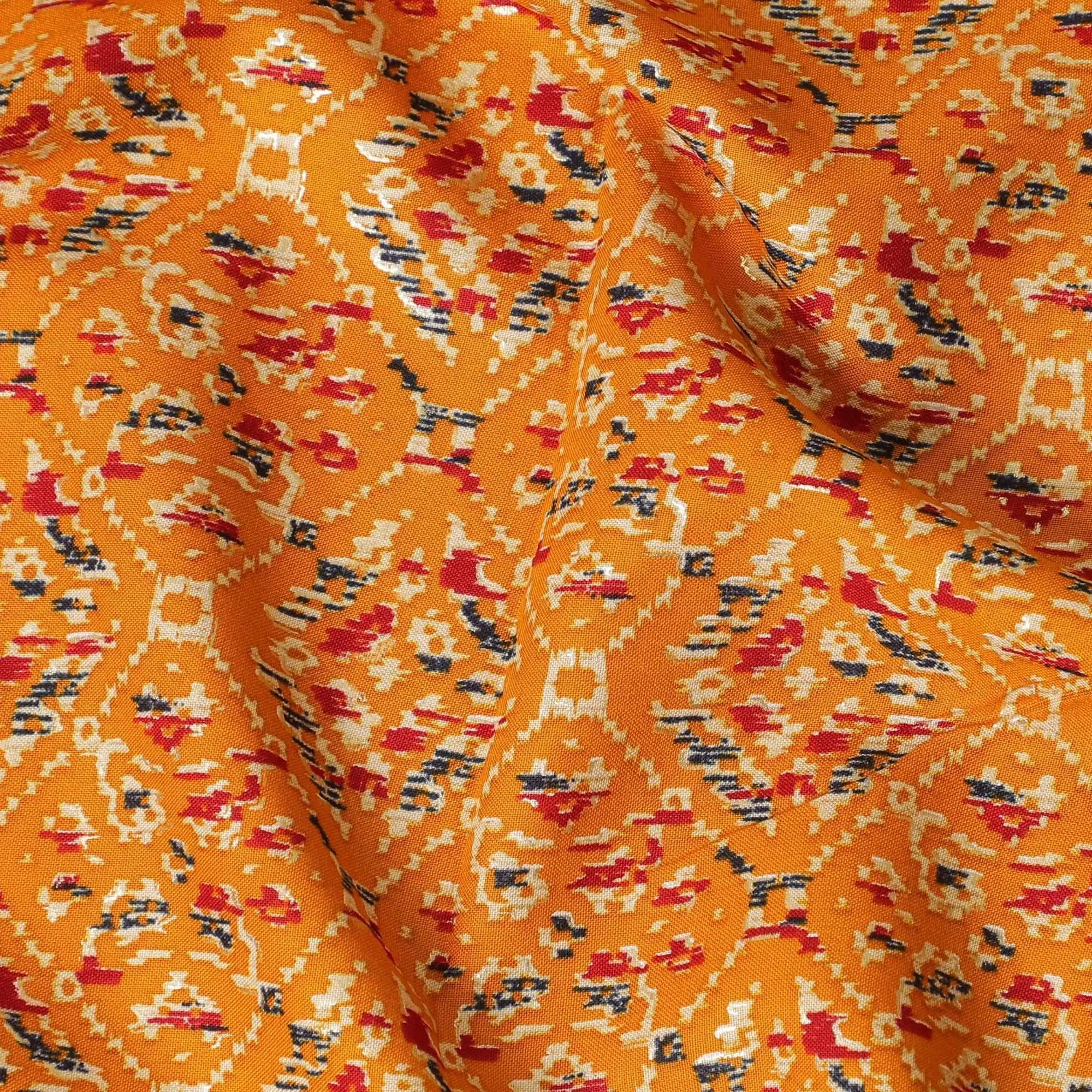 Mustard orange cotton viscose fabric with black, orange and gold print in batik design-D14195